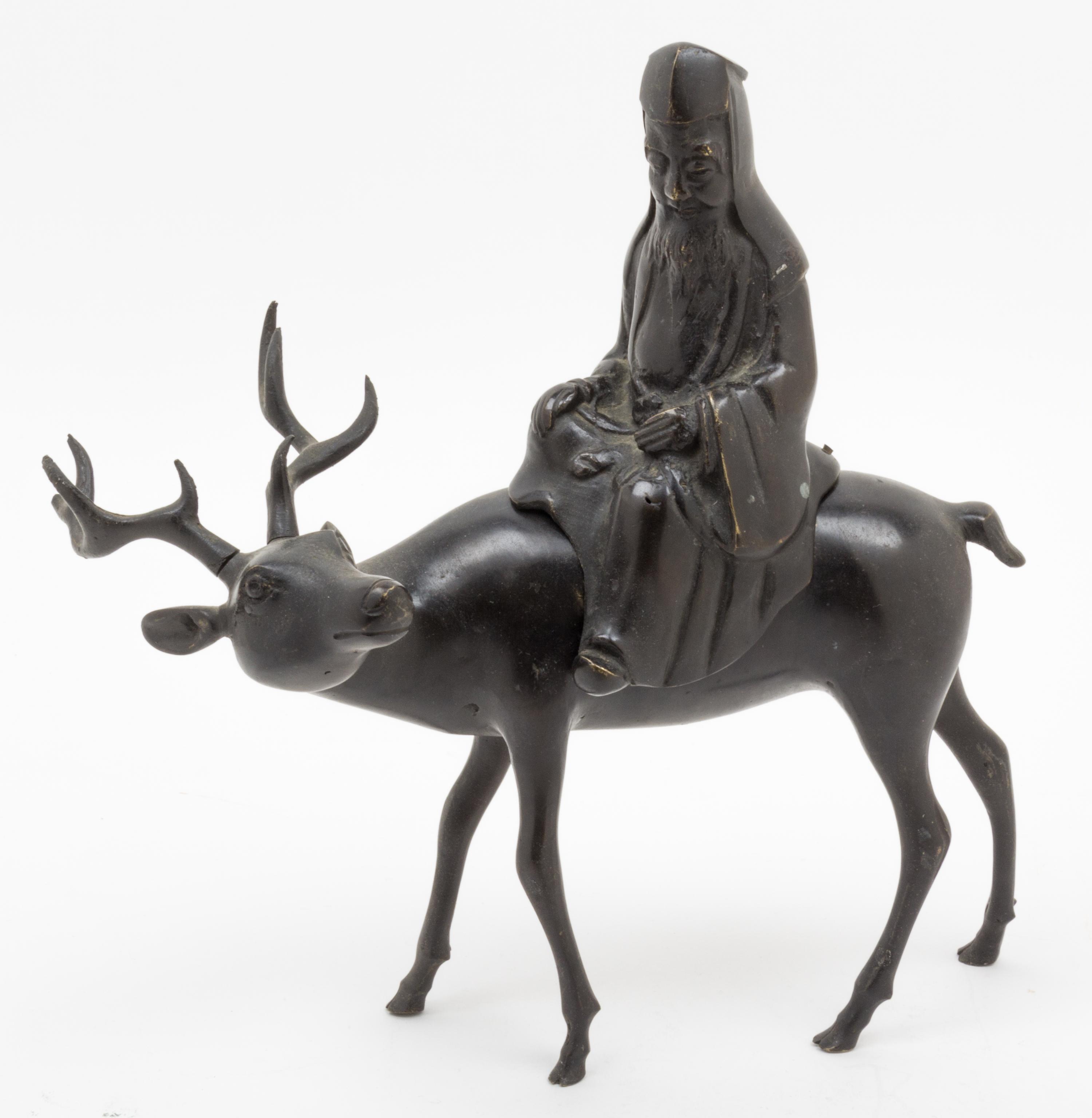 A Bronze Figural Censer Length 11 1/2 inches.