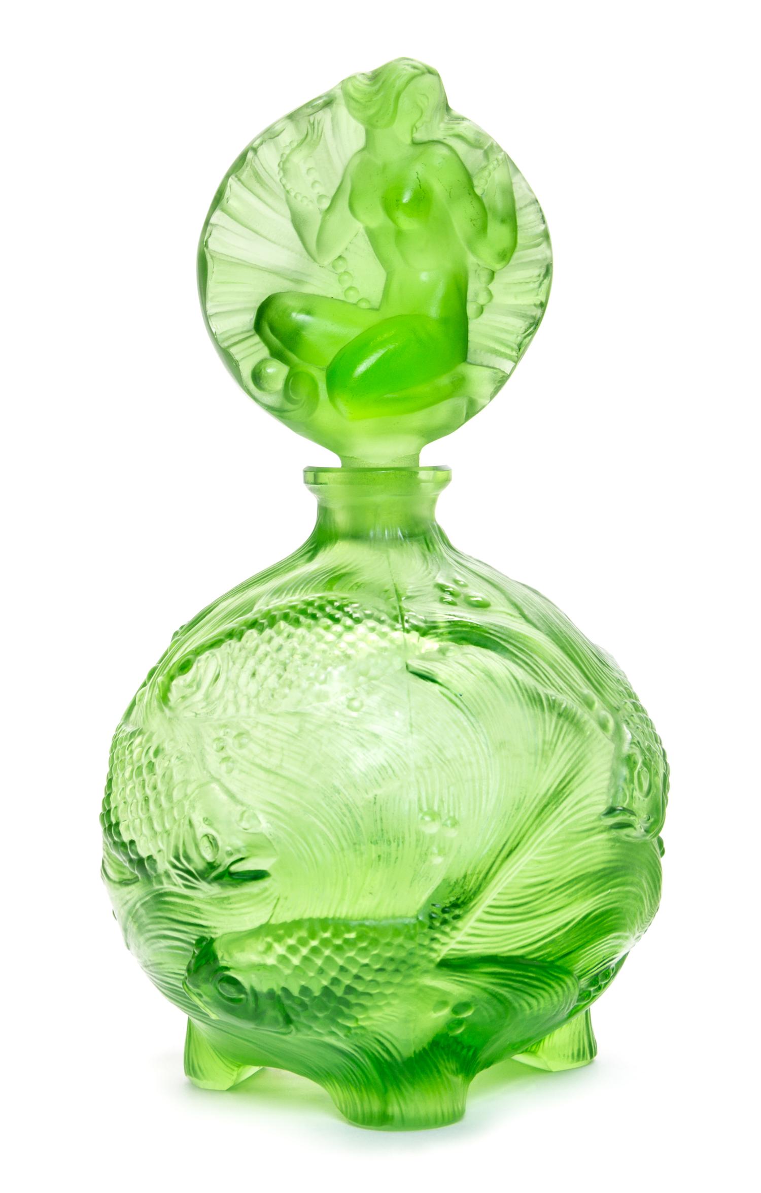 A Czechoslovakian Molded Glass Perfume Bottle Height 7 1/4 inches. — FIRST HALF 20TH CENTURY