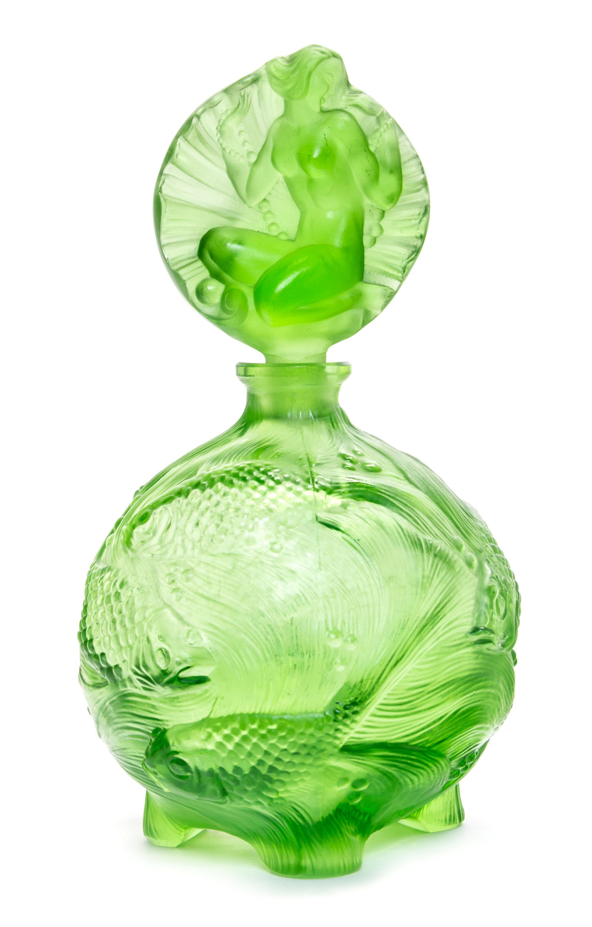 A Czechoslovakian Molded Glass Perfume Bottle Height 7 1/4 inches. — FIRST HALF 20TH CENTURY