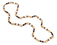 A Yellow Gold, Cultured South Sea Pearl, Diamond and Onyx Longchain Necklace, 131.00 dwts.