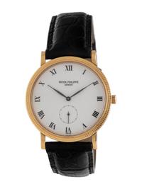 PATEK PHILIPPE, REF. 3919 18K YELLOW GOLD 'CALATRAVA' WRISTWATCH