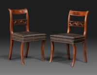 A Pair of Classical Carved and Figured Mahogany Klismos Side Chair