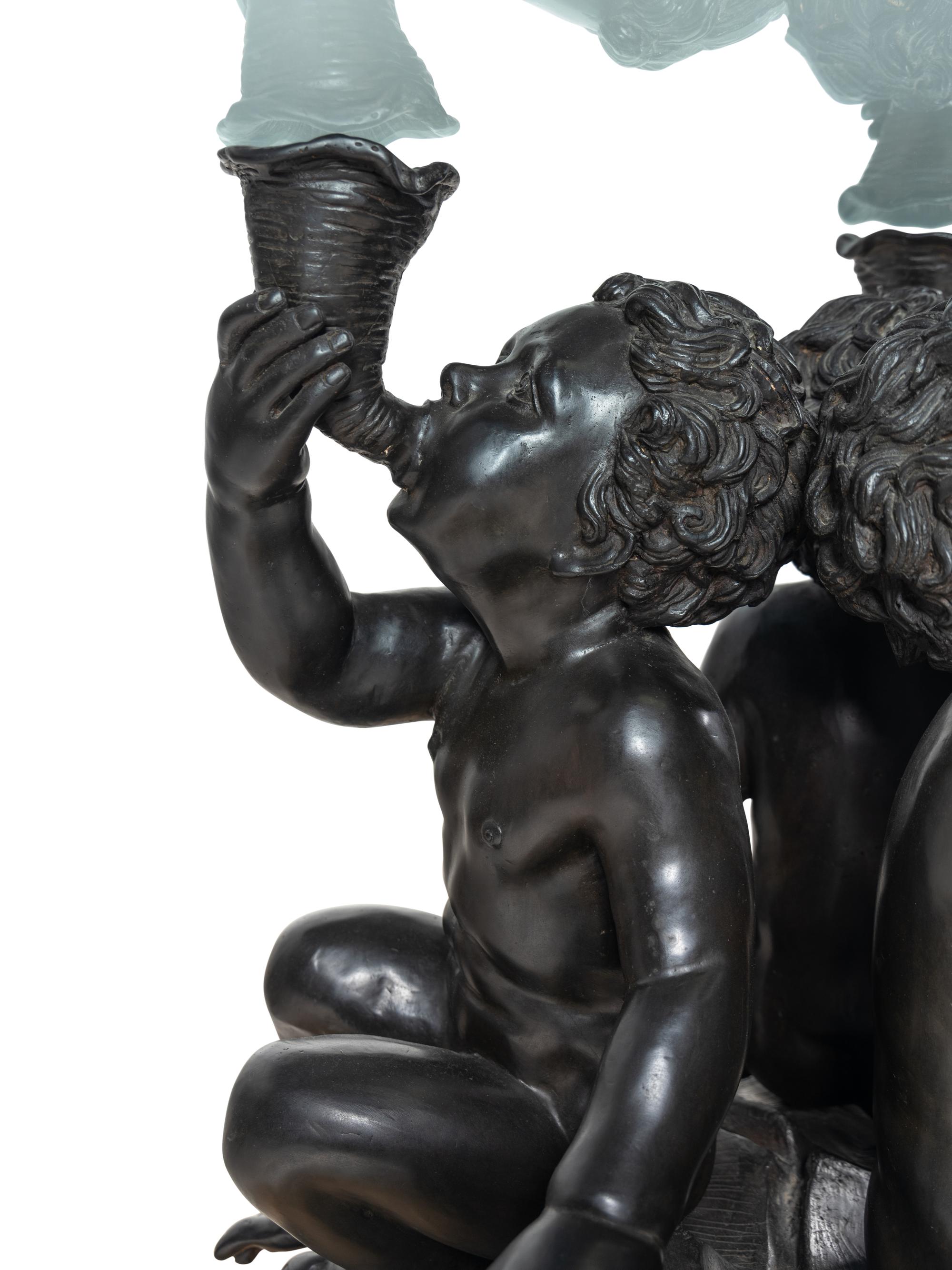 A Continental Patinated Cast Metal Center Table