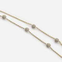 A Contemporary Gold and Diamond Ring and Necklace