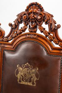 An Italian Baroque Style Leather-Upholstered Carved Walnut Armchair — 19TH CENTURY