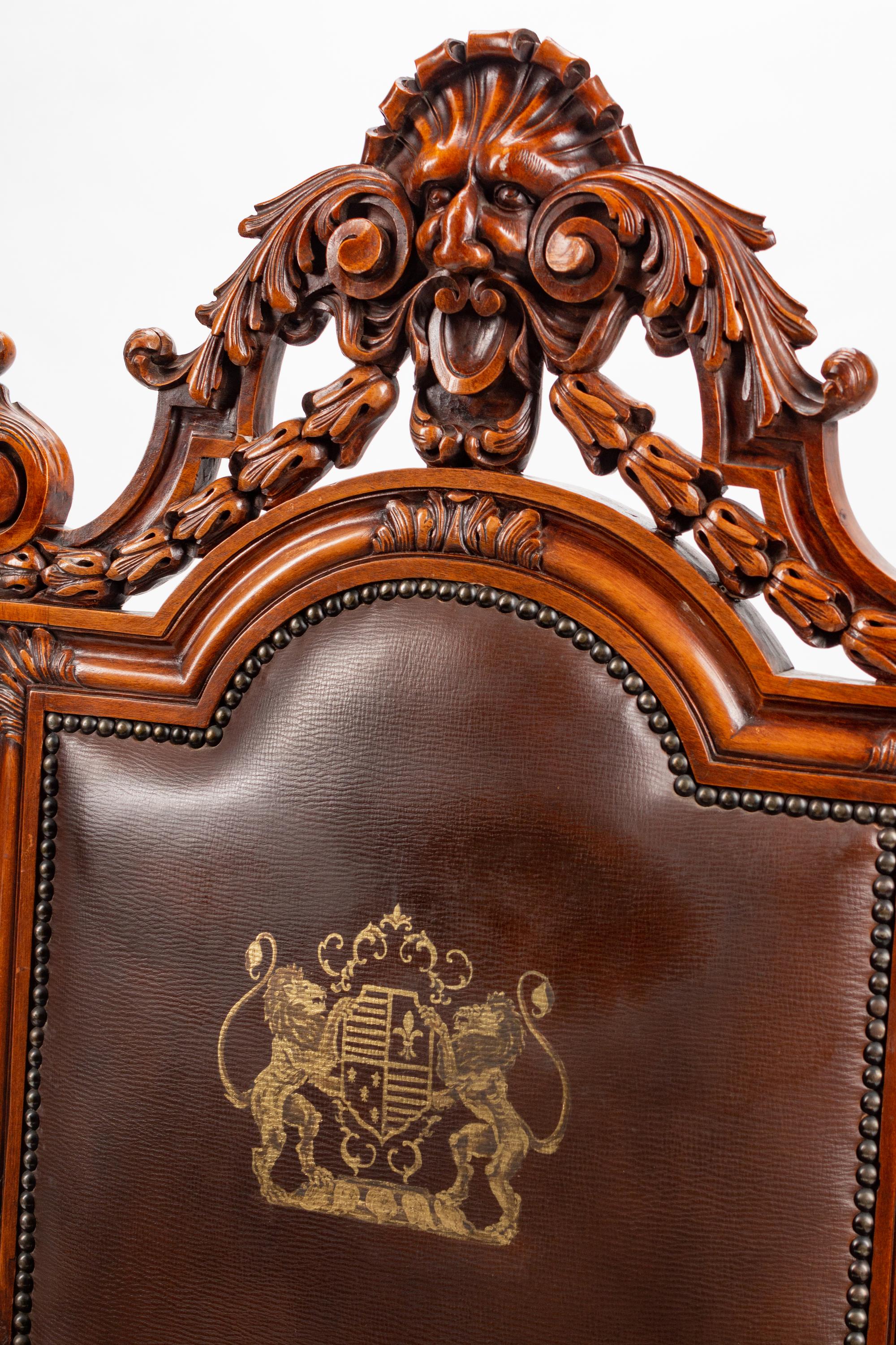 An Italian Baroque Style Leather-Upholstered Carved Walnut Armchair — 19TH CENTURY