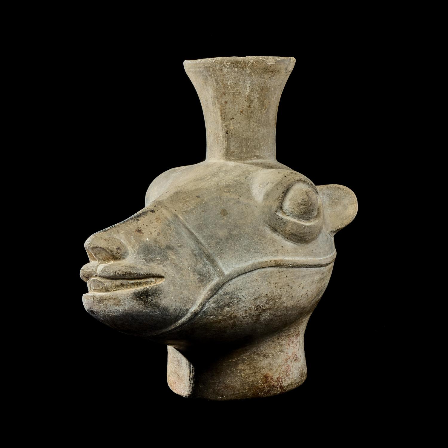 An Inca Terracotta Llama Head Vessel
