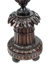 A Pair of Italian Carved Walnut Torchères