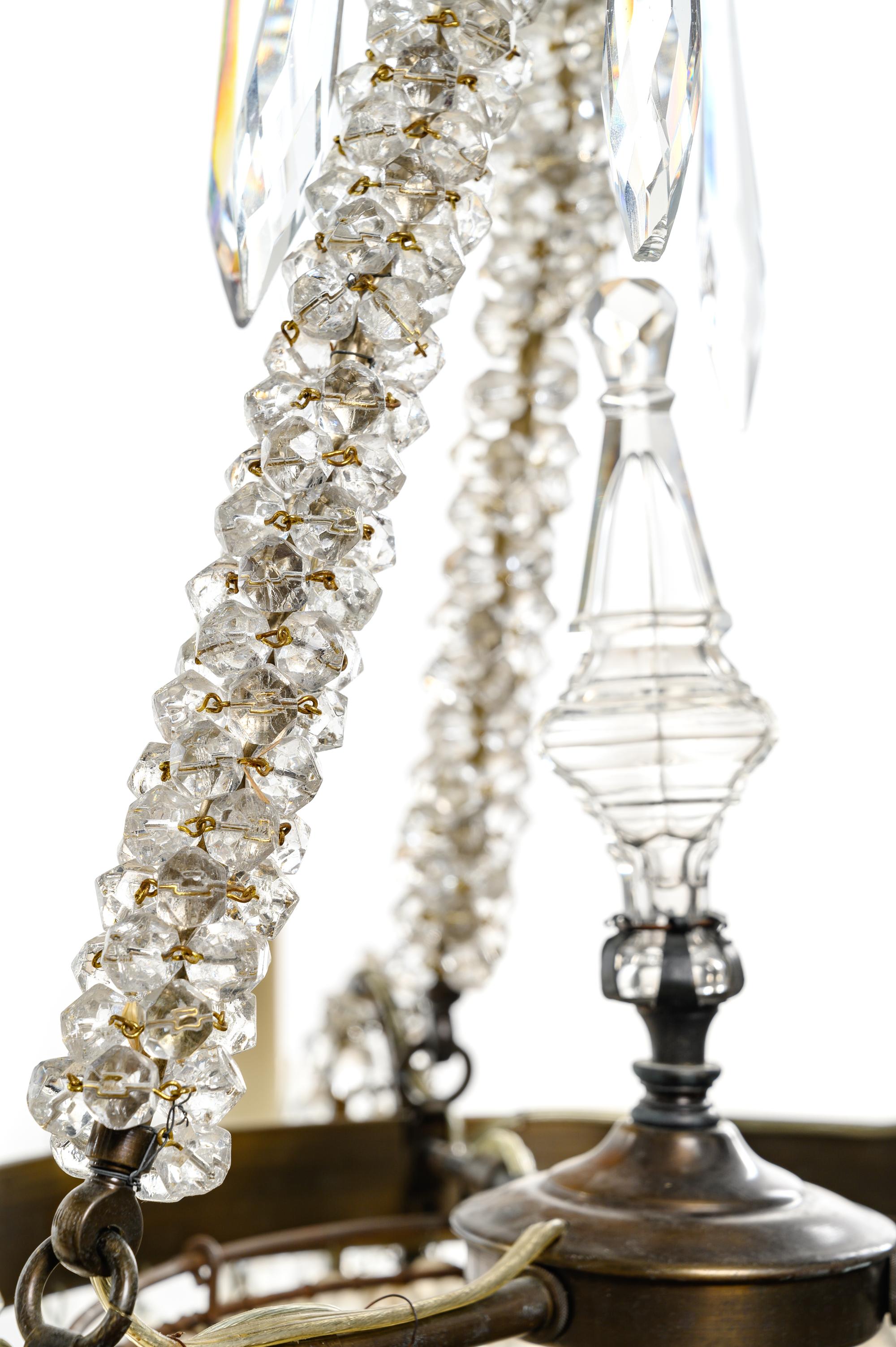 A French Gilt Metal and Cut Glass Six-Light Chandelier