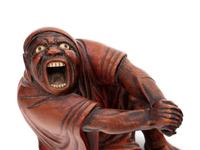 A Carved Wood Figure of Devil