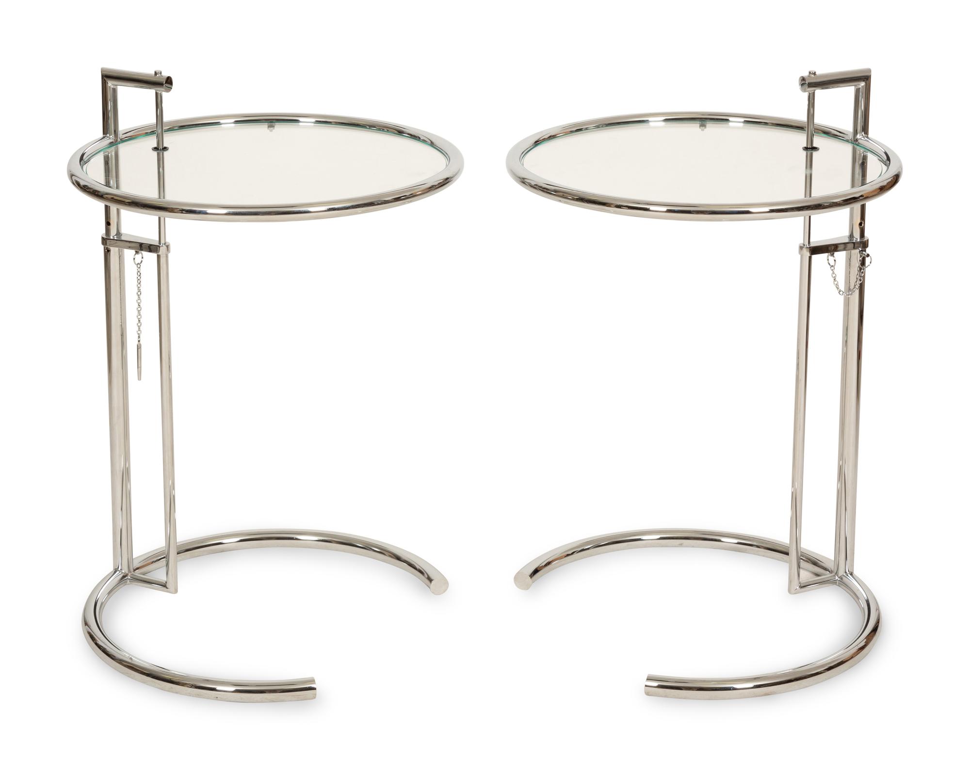 A Pair of Chrome and Glass Adjustble Side Tables