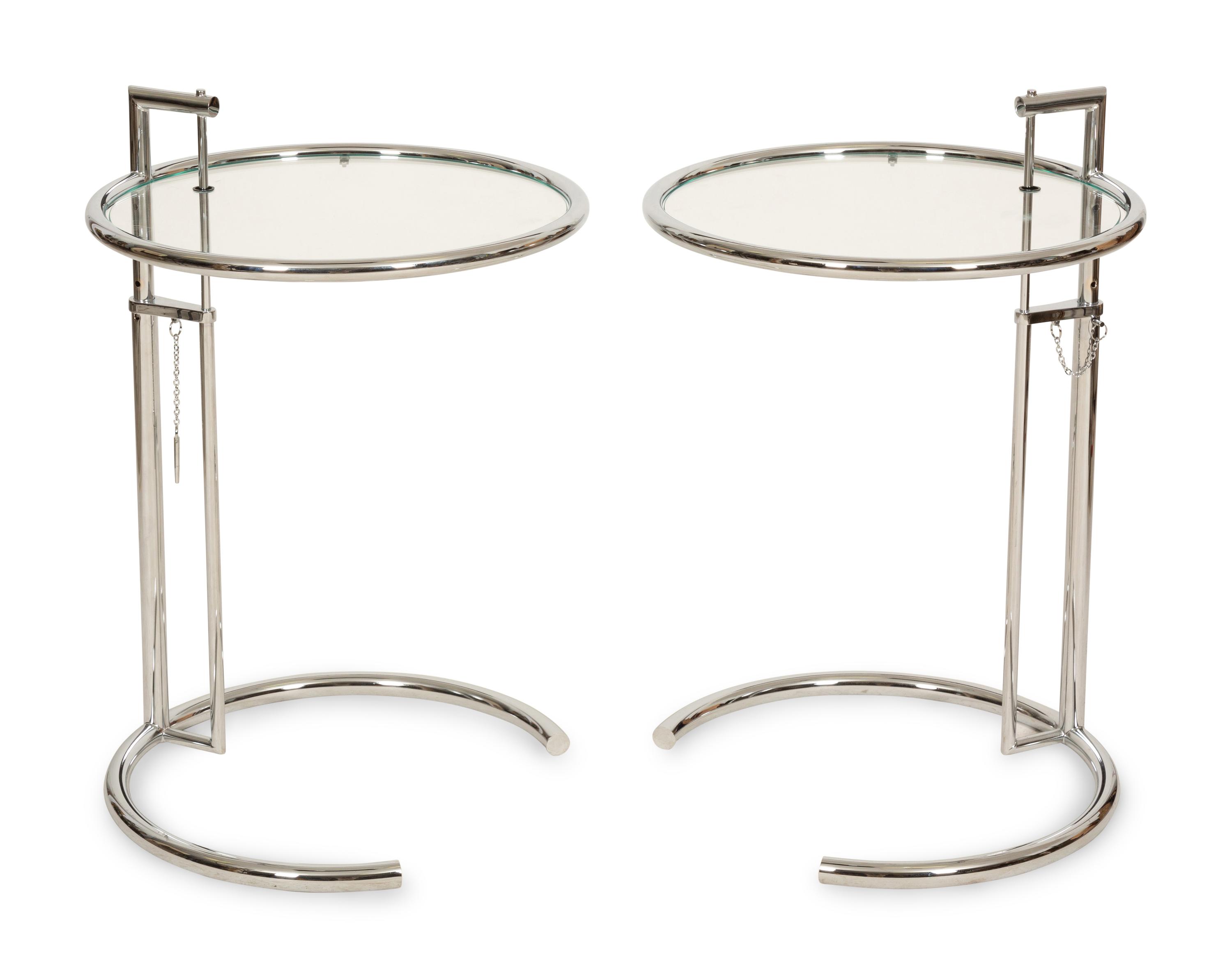 A Pair of Chrome and Glass Adjustble Side Tables