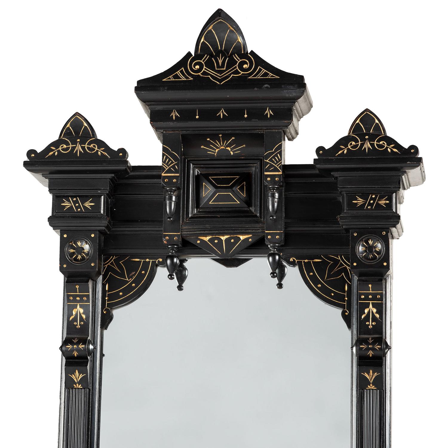 A Victorian Ebonized and Parcel Gilt Pier Mirror