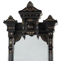 A Victorian Ebonized and Parcel Gilt Pier Mirror