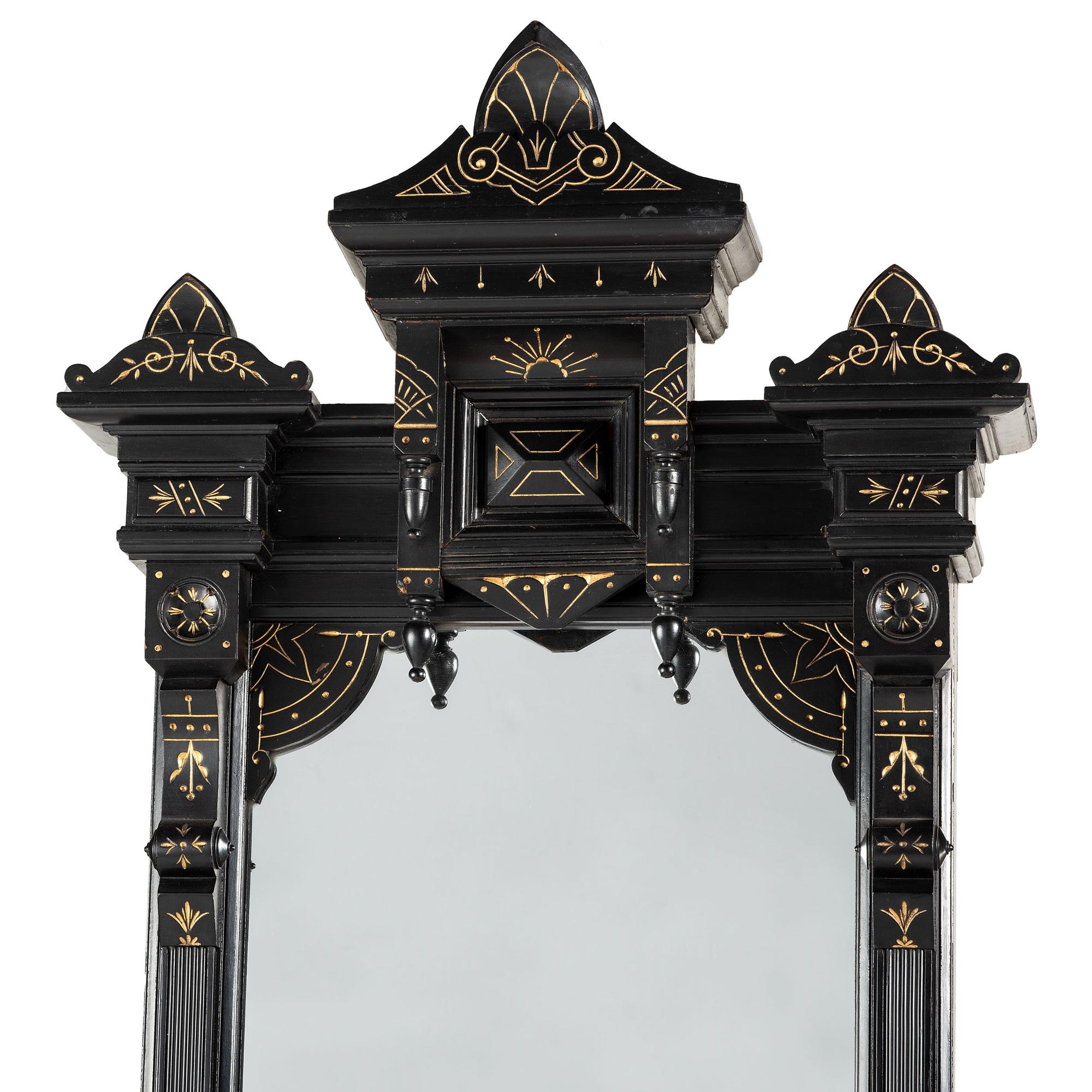 A Victorian Ebonized and Parcel Gilt Pier Mirror