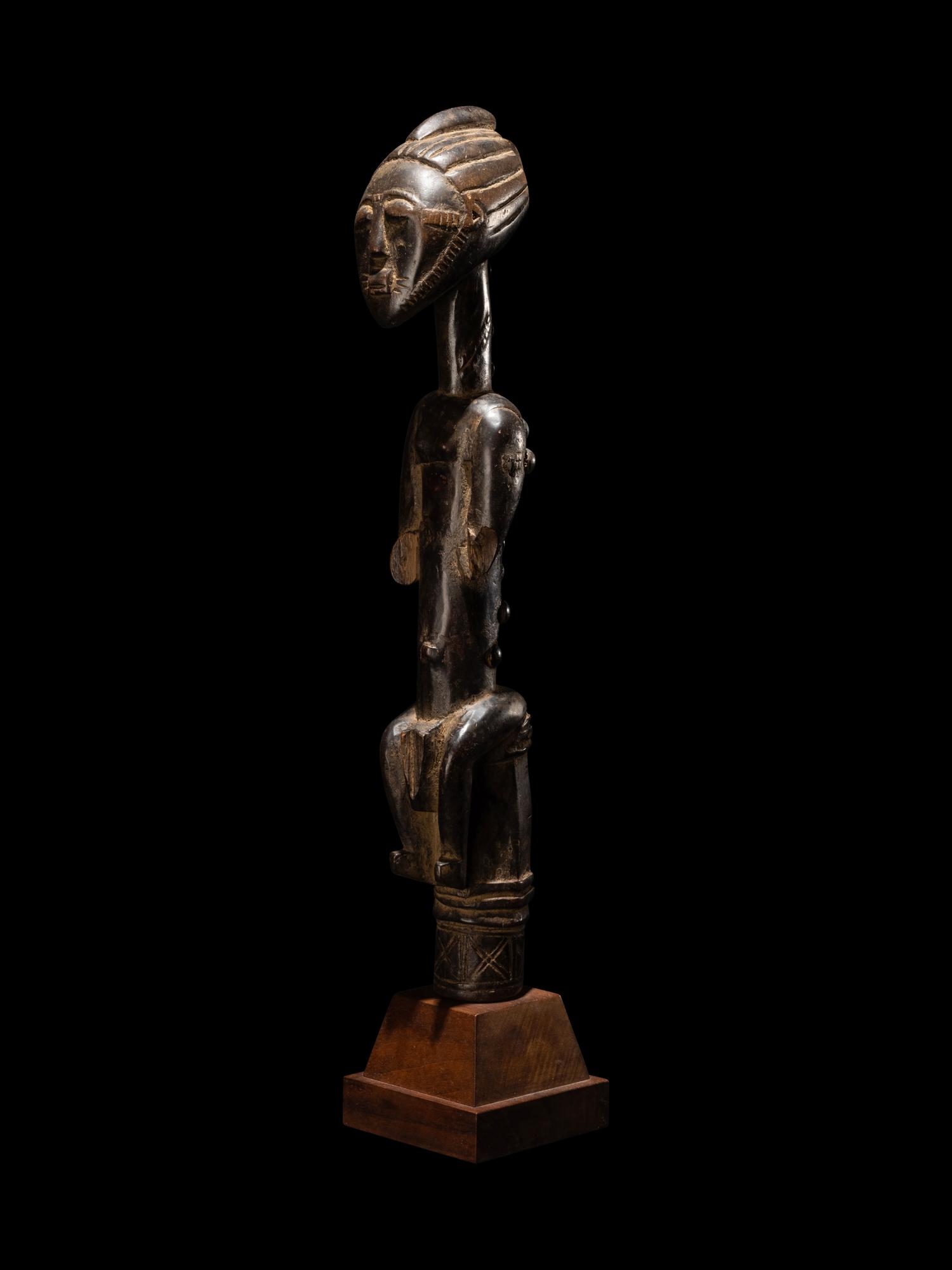 An African Carved Staff Top or Finial