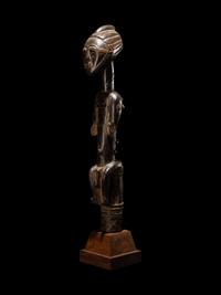 An African Carved Staff Top or Finial
