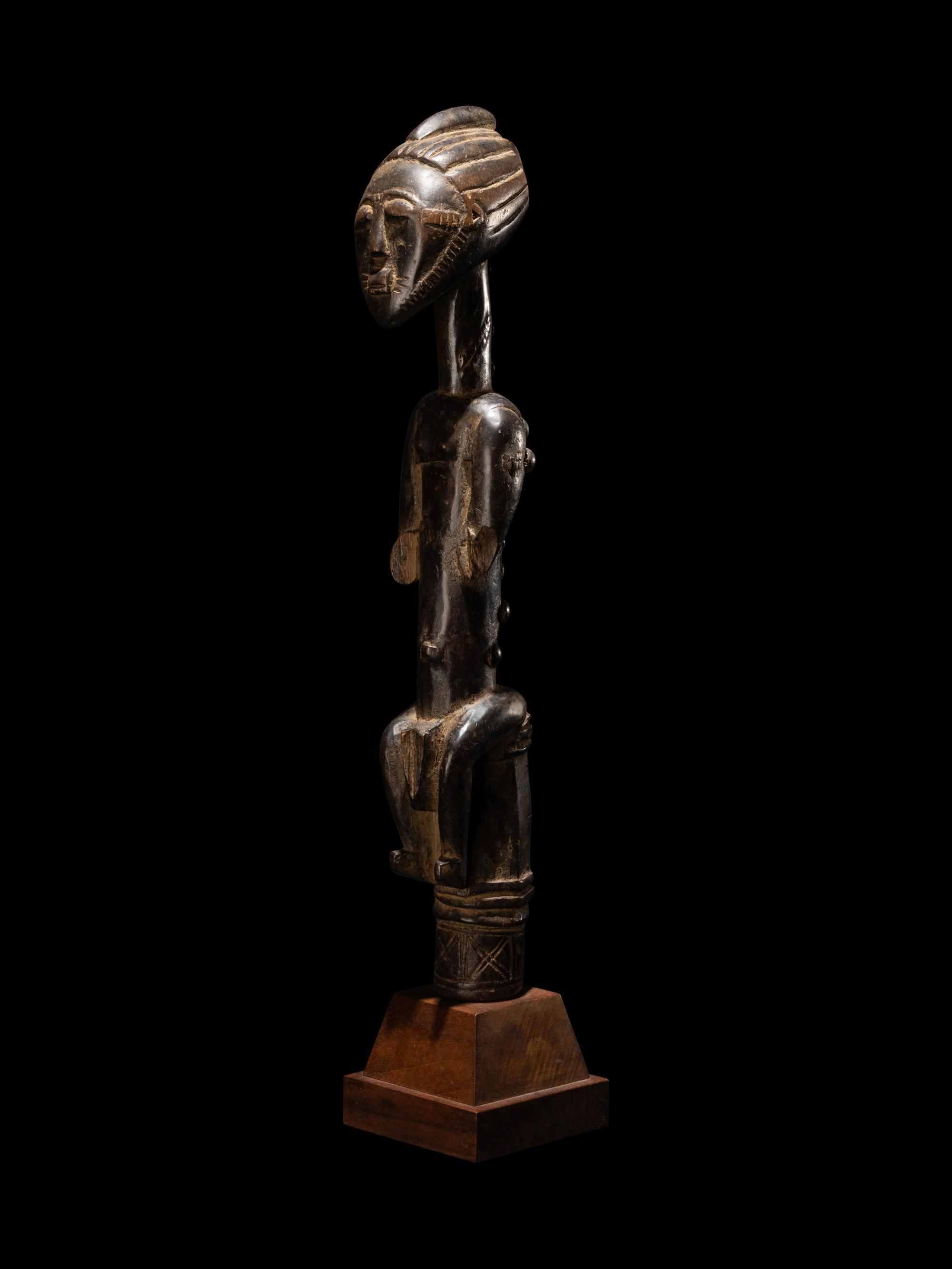 An African Carved Staff Top or Finial