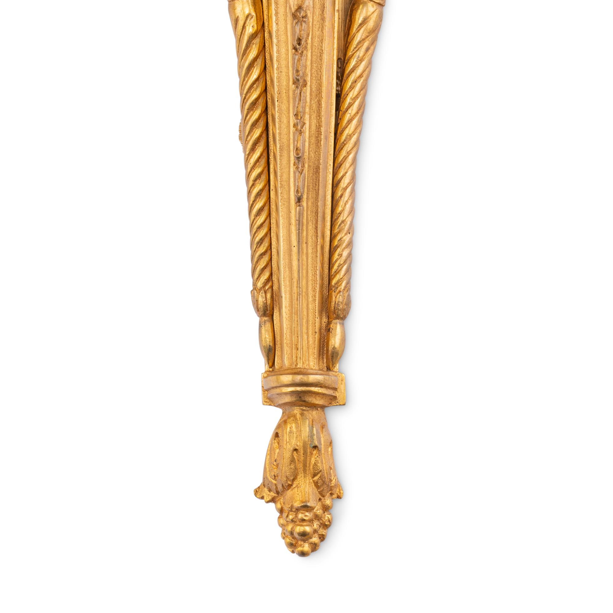 A Pair of French Gilt Bronze Figural Single-Light Sconces