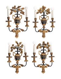 A Set of Four Italian Painted and Parcel Gilt Sconces