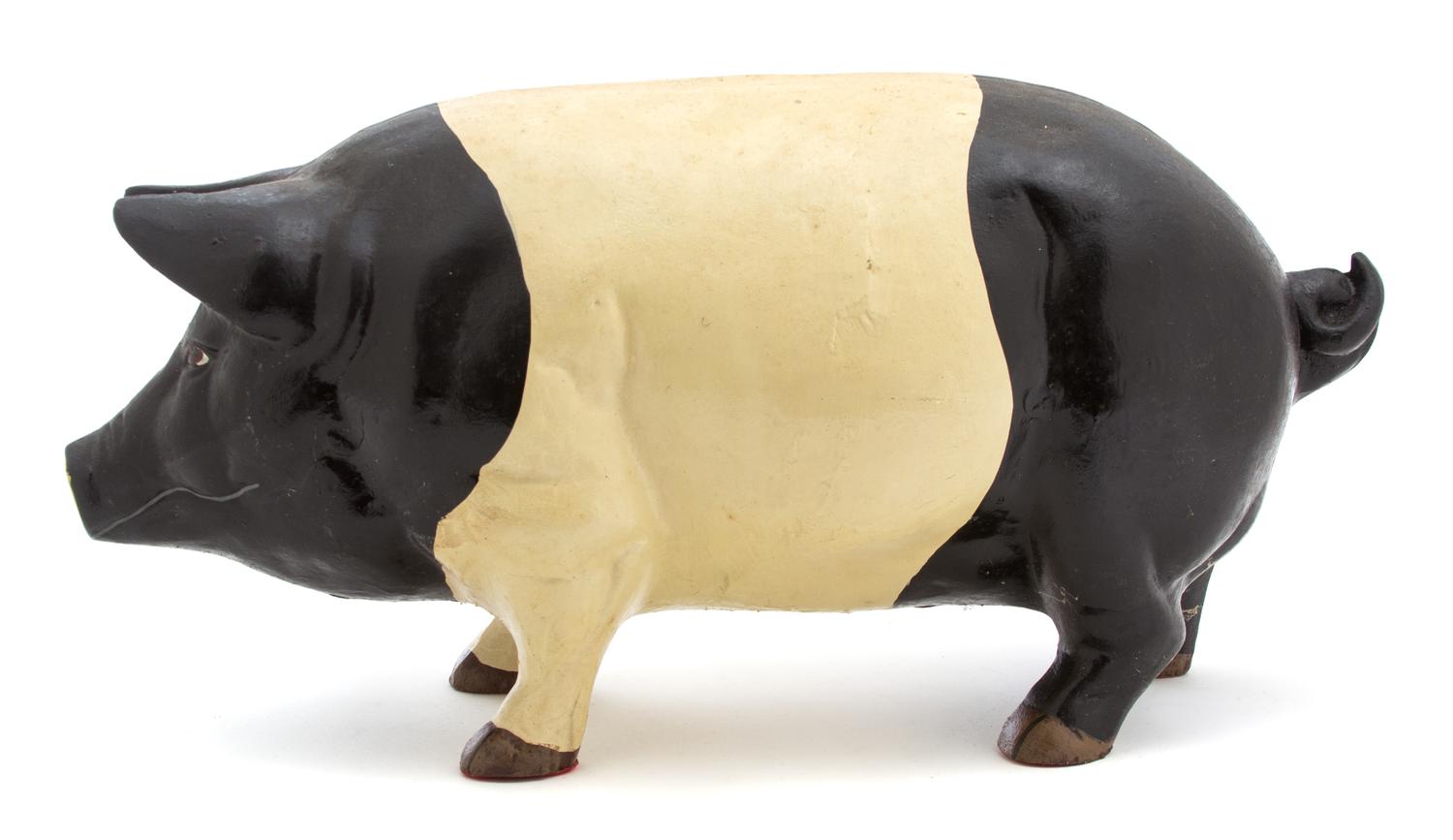 A Collection of Three Metal Pigs Largest height 9 x length 17 1/2 inches.