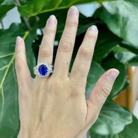 A 14K white gold, tanzanite, and diamond ring