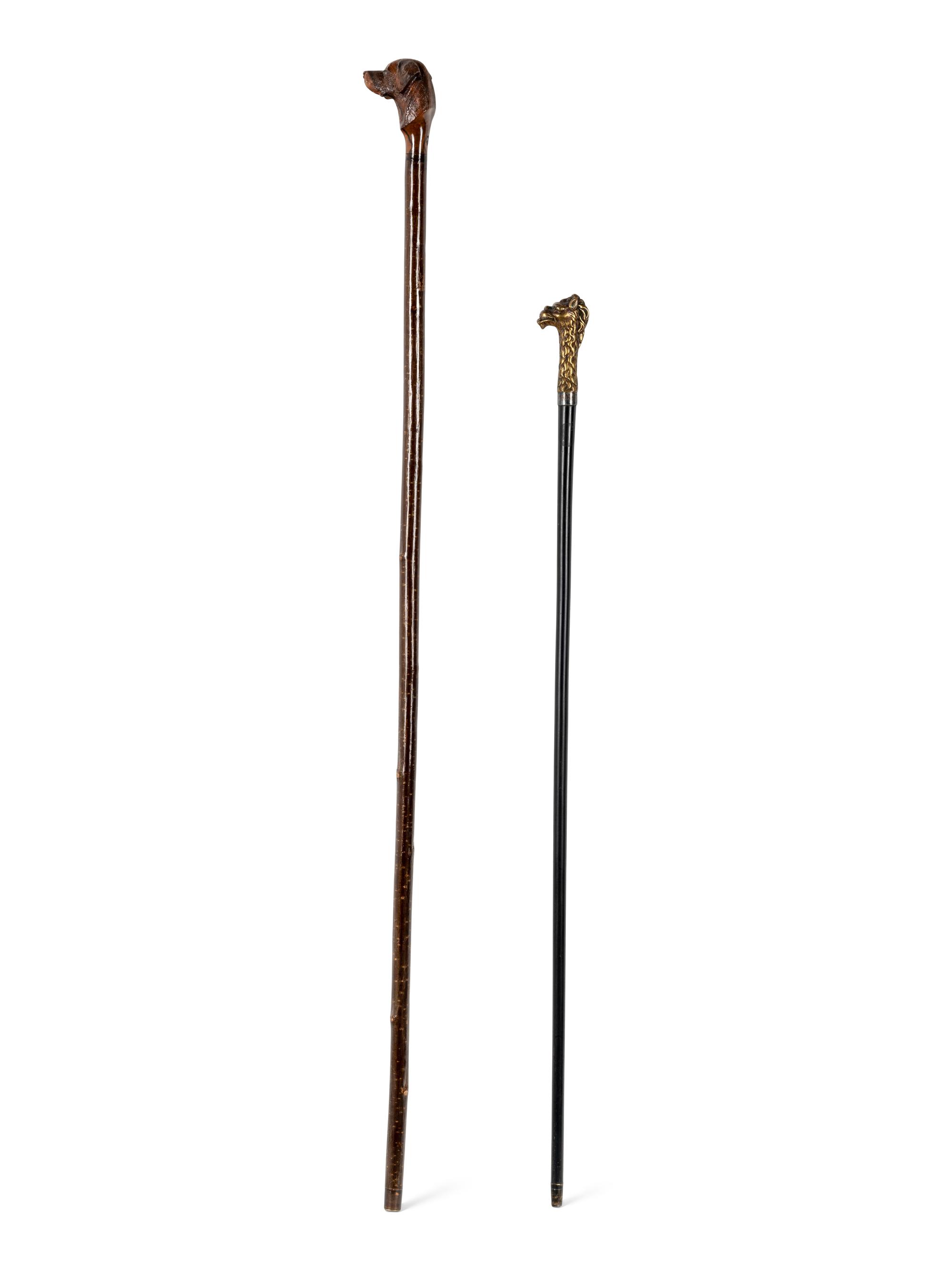 Two Figural Walking Sticks or Canes