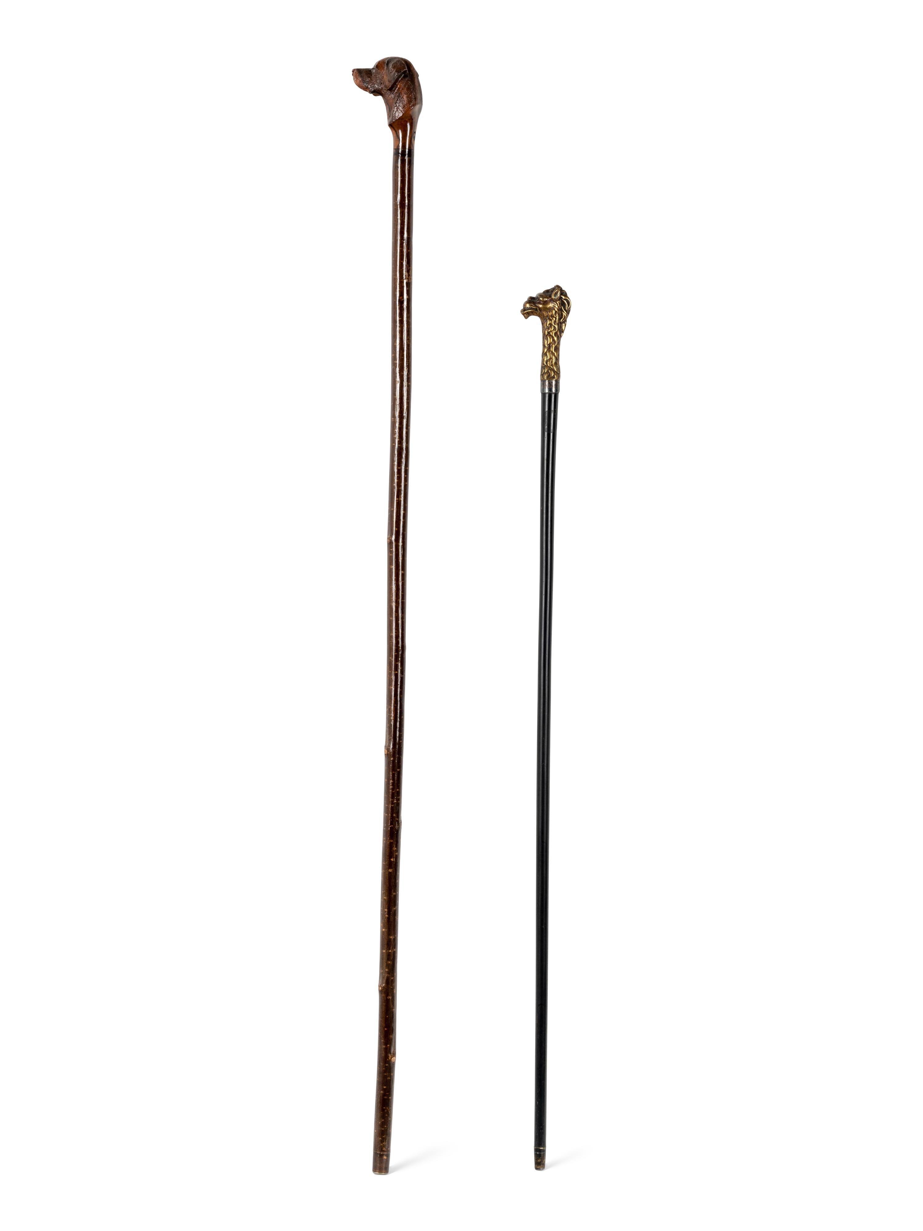 Two Figural Walking Sticks or Canes