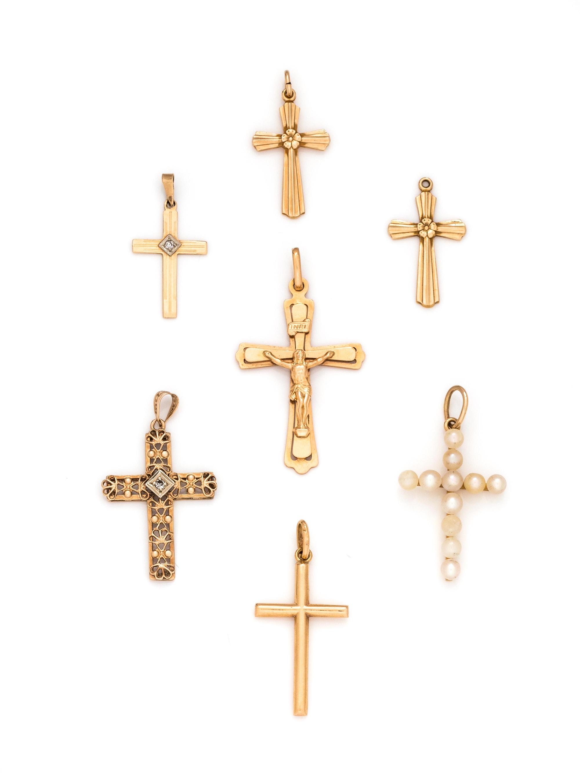 COLLECTION OF YELLOW GOLD CROSS PENDANTS
