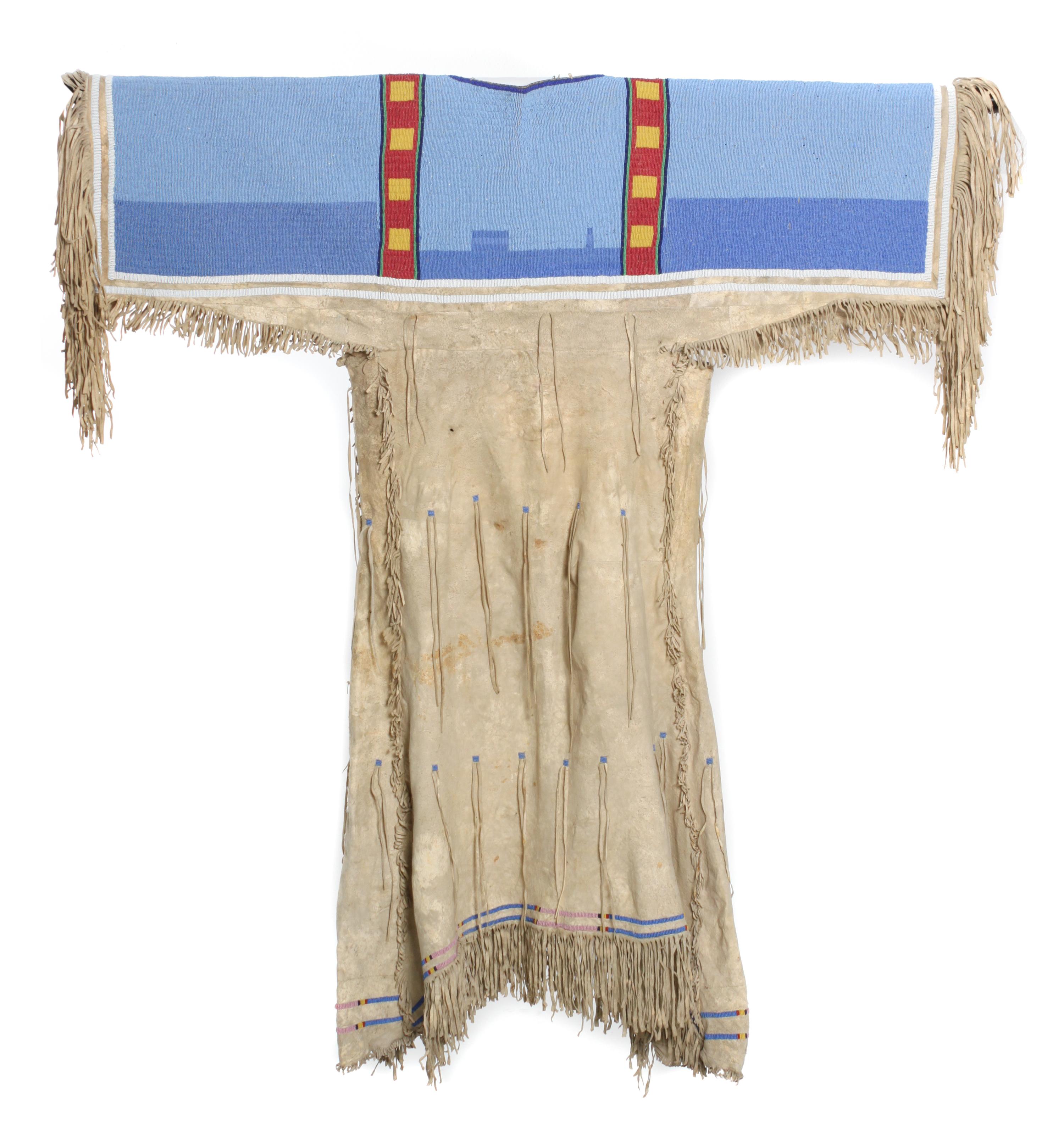 A Shoshone Beaded Hide Dress Length 55 x width 48 inches. — CIRCA 1885