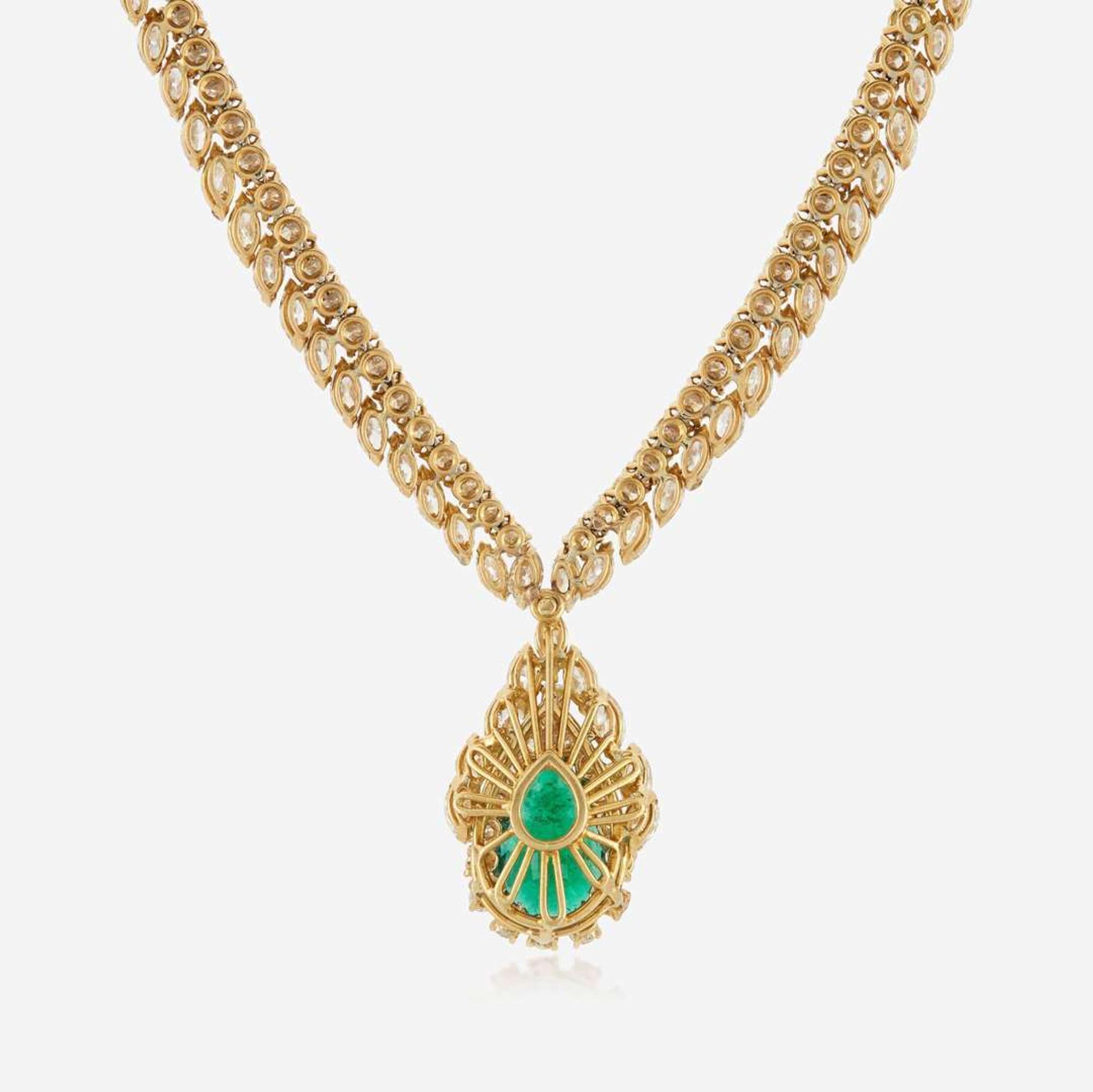 An emerald, diamond, and gold necklace