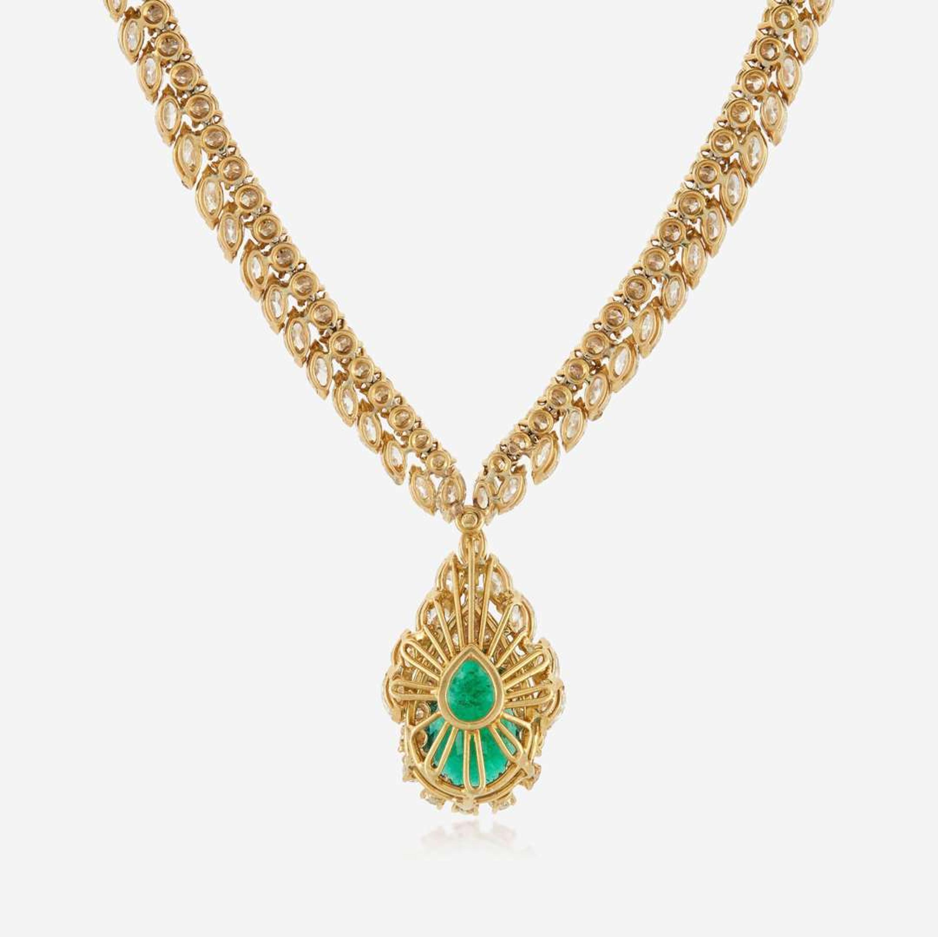 An emerald, diamond, and gold necklace