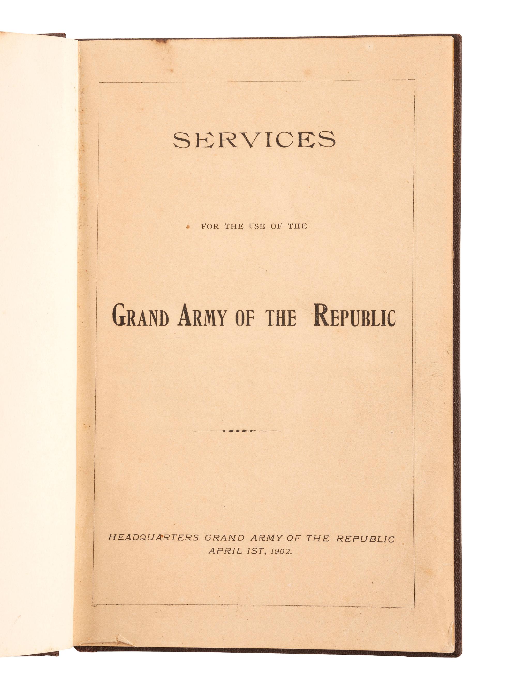 [CIVIL WAR -- VETERAN ORGANIZATIONS]. Memorial book, card, and badge, Corporal William H. Woodrow, Company C, 84th Ohio Infantry.