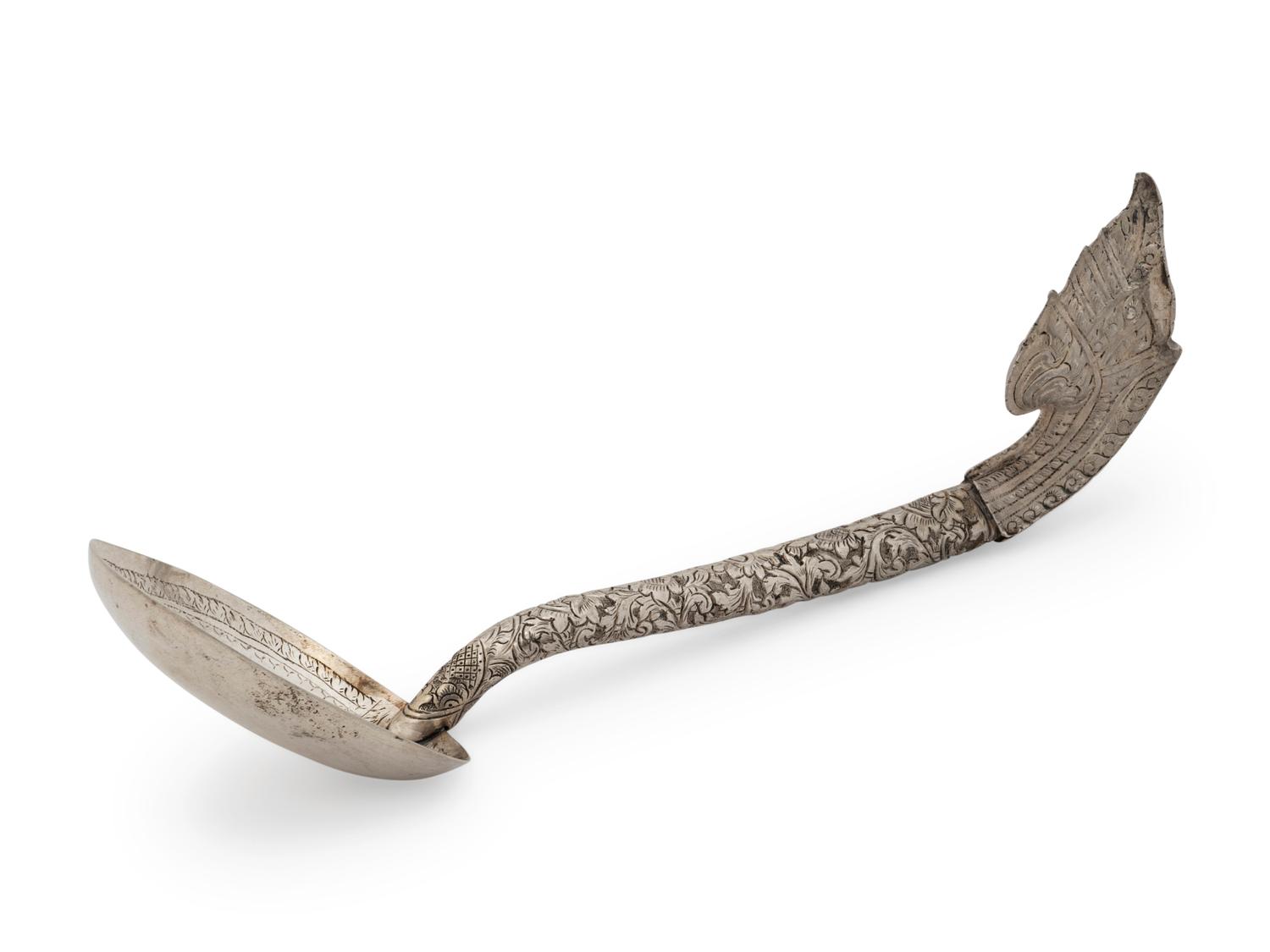A Burmese Silver Repousse Ladle — 20th Century