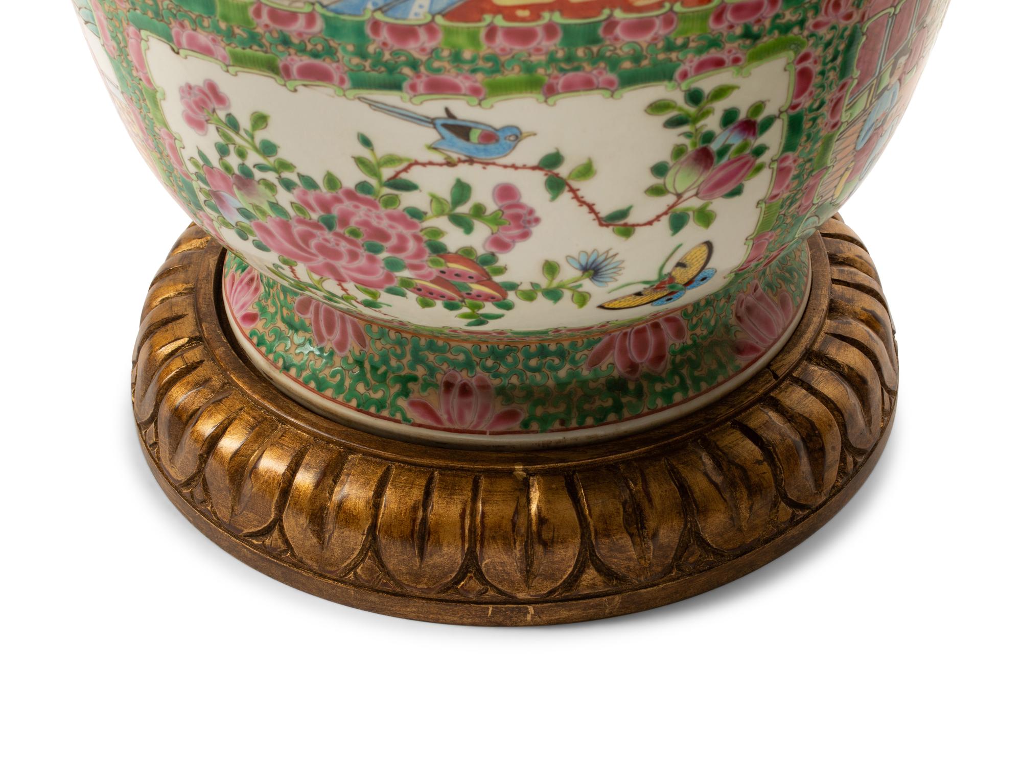 A Pair of Rose Medallion Porcelain Vases on Carved Giltwood Bases