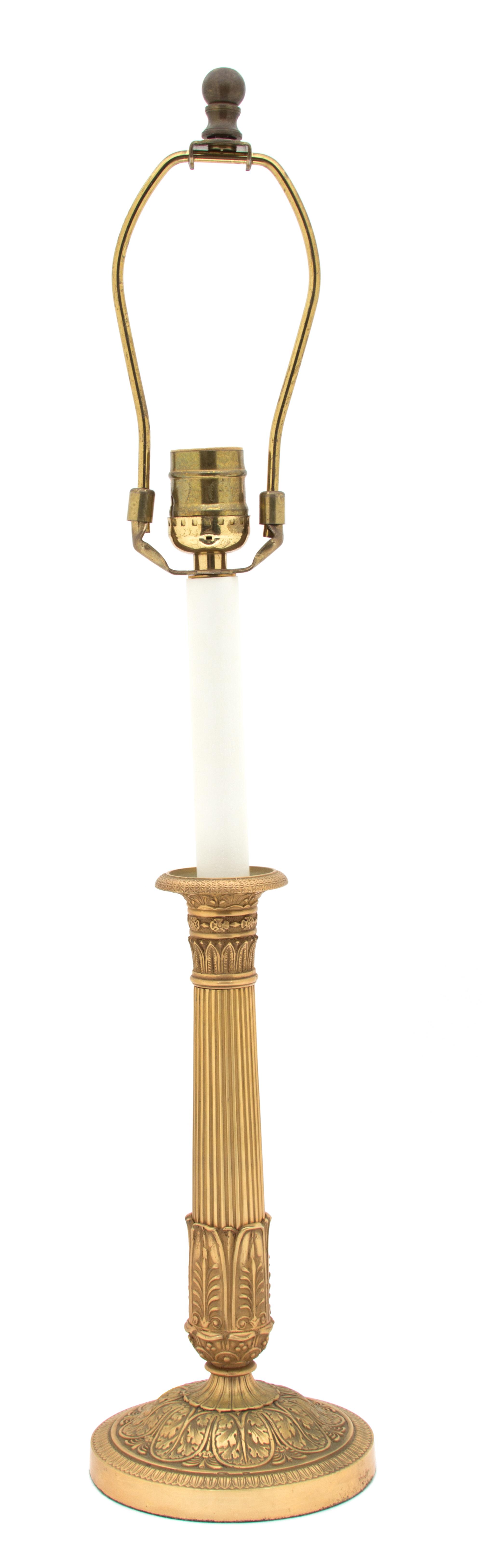 A French Empire Style Gilt Bronze Candlestick-Form Lamp Height 23 1/2 inches. — 20TH CENTURY