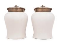A Pair of Brass Mounted White Glazed Porcelain Jars
