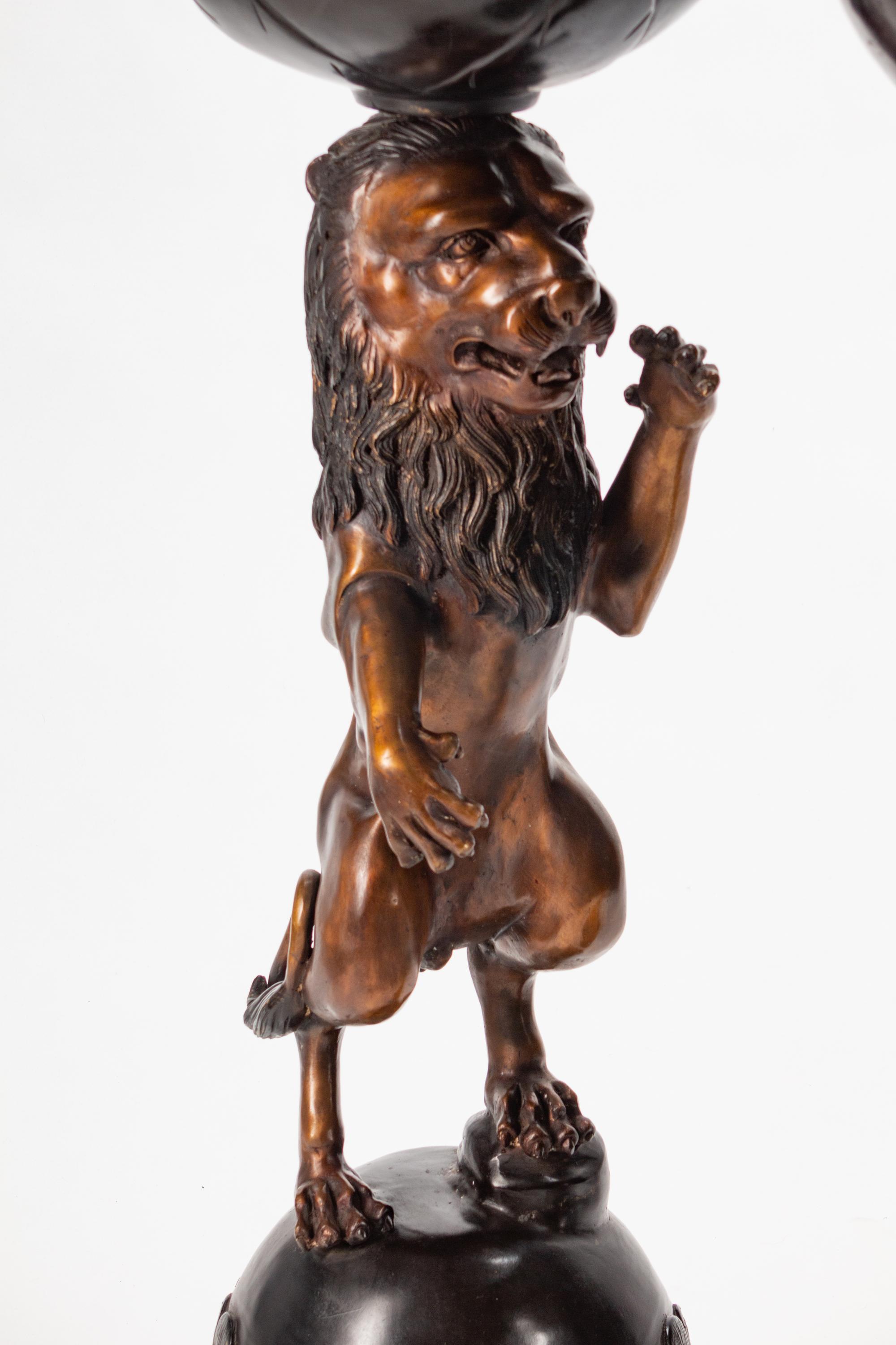 A Pair of Bronze Lion-Form Jardinières
