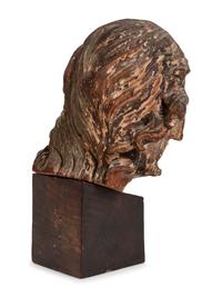 A Continental Carved and Polychromed Bust of a Saint