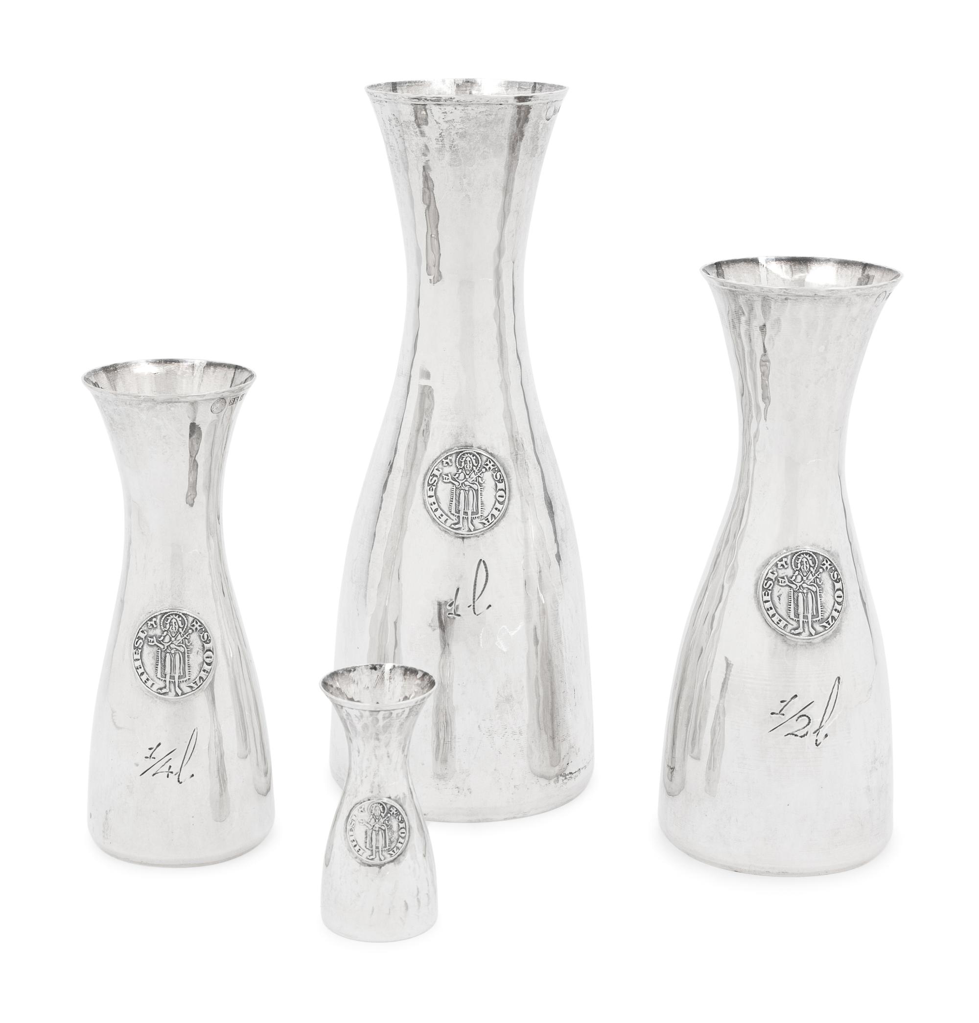 Four Italian Silver Carafes