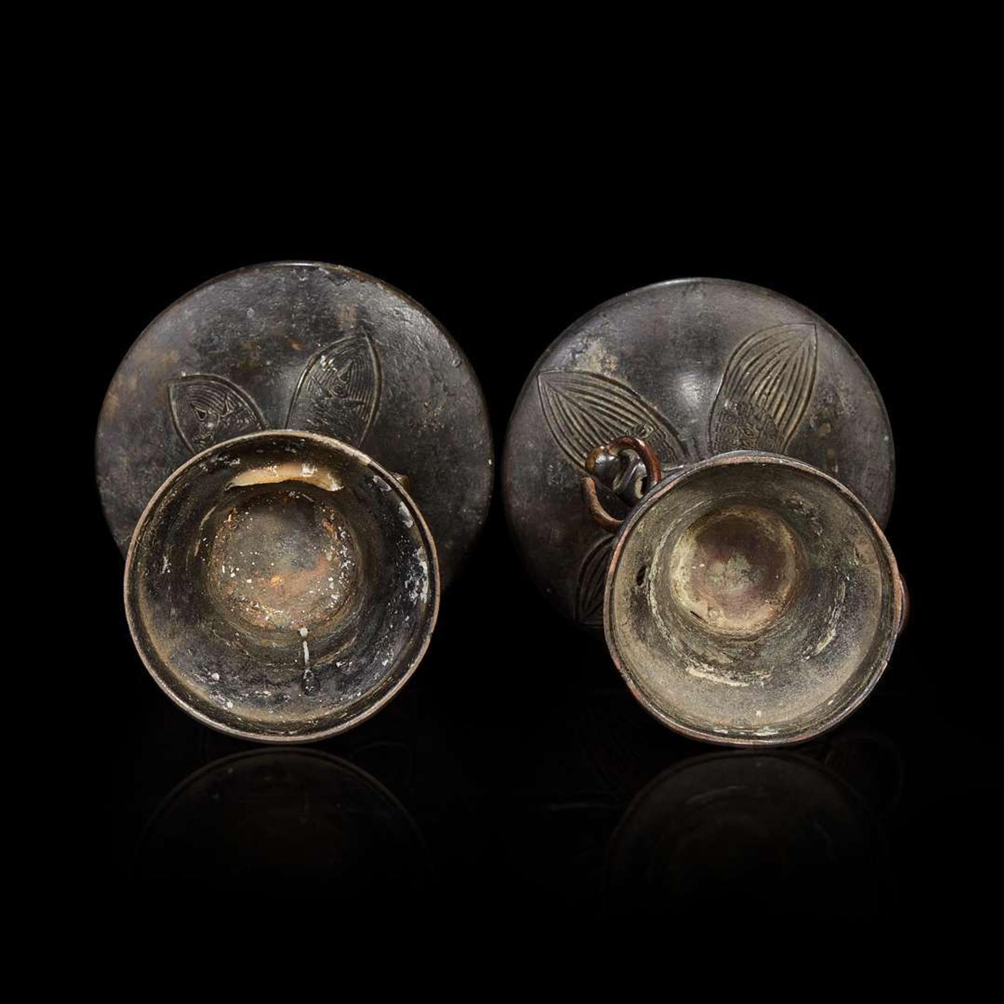Two patinated bronze archaistic gu-form vases 18th/19th century or earlier