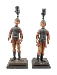 A Pair of Spanish Carved and Polychrome Decorated Figures