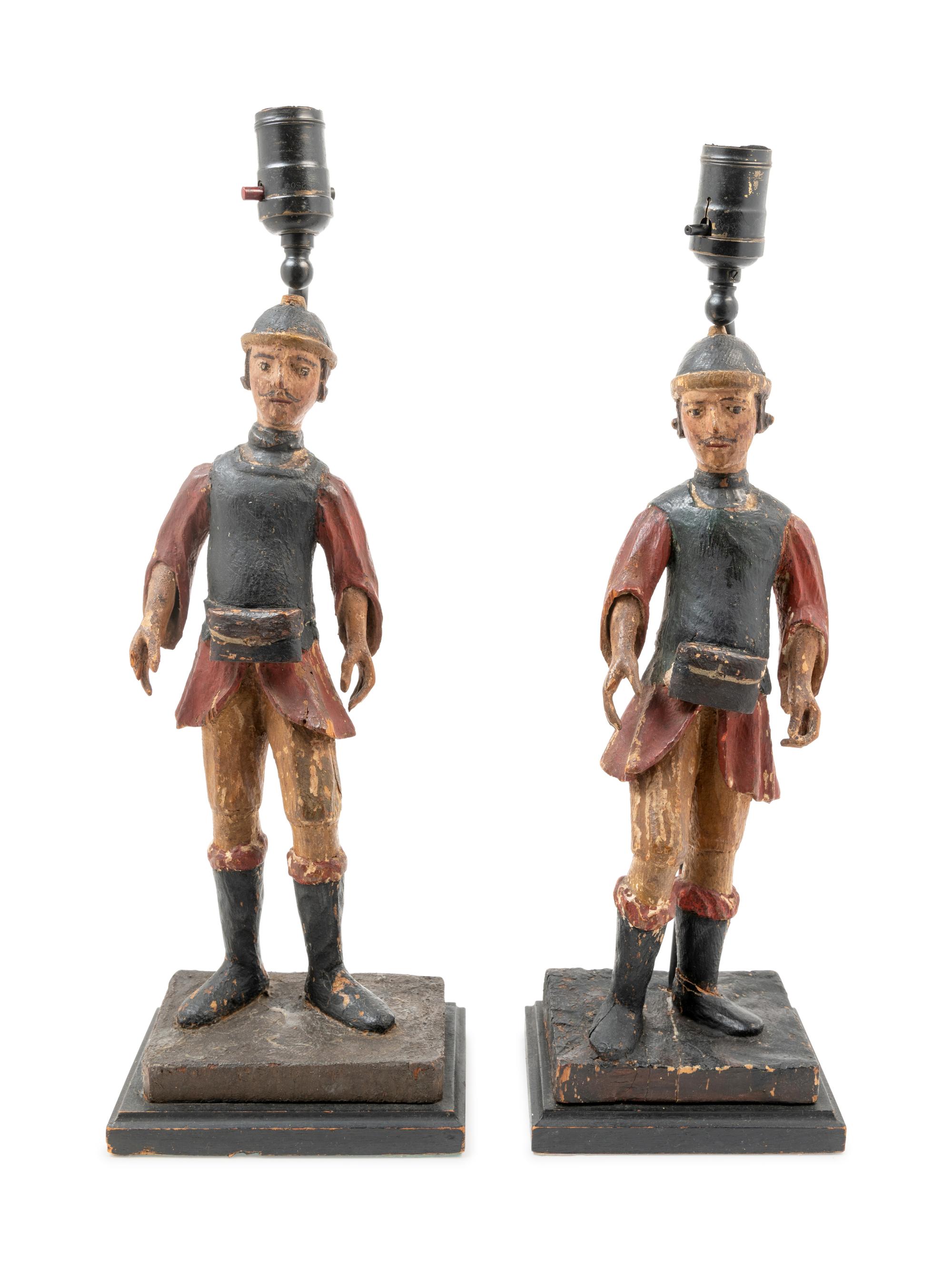 A Pair of Spanish Carved and Polychrome Decorated Figures