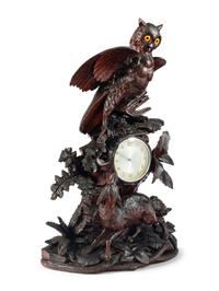 A Swiss "Black Forest" Carved Wood Clock