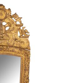 A Continental Carved Giltwood Wall Mirror