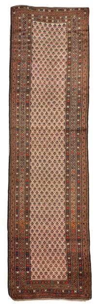 A Northwest Persian Wool Runner, 11 feet 6 inches x 3 feet 5 inches.