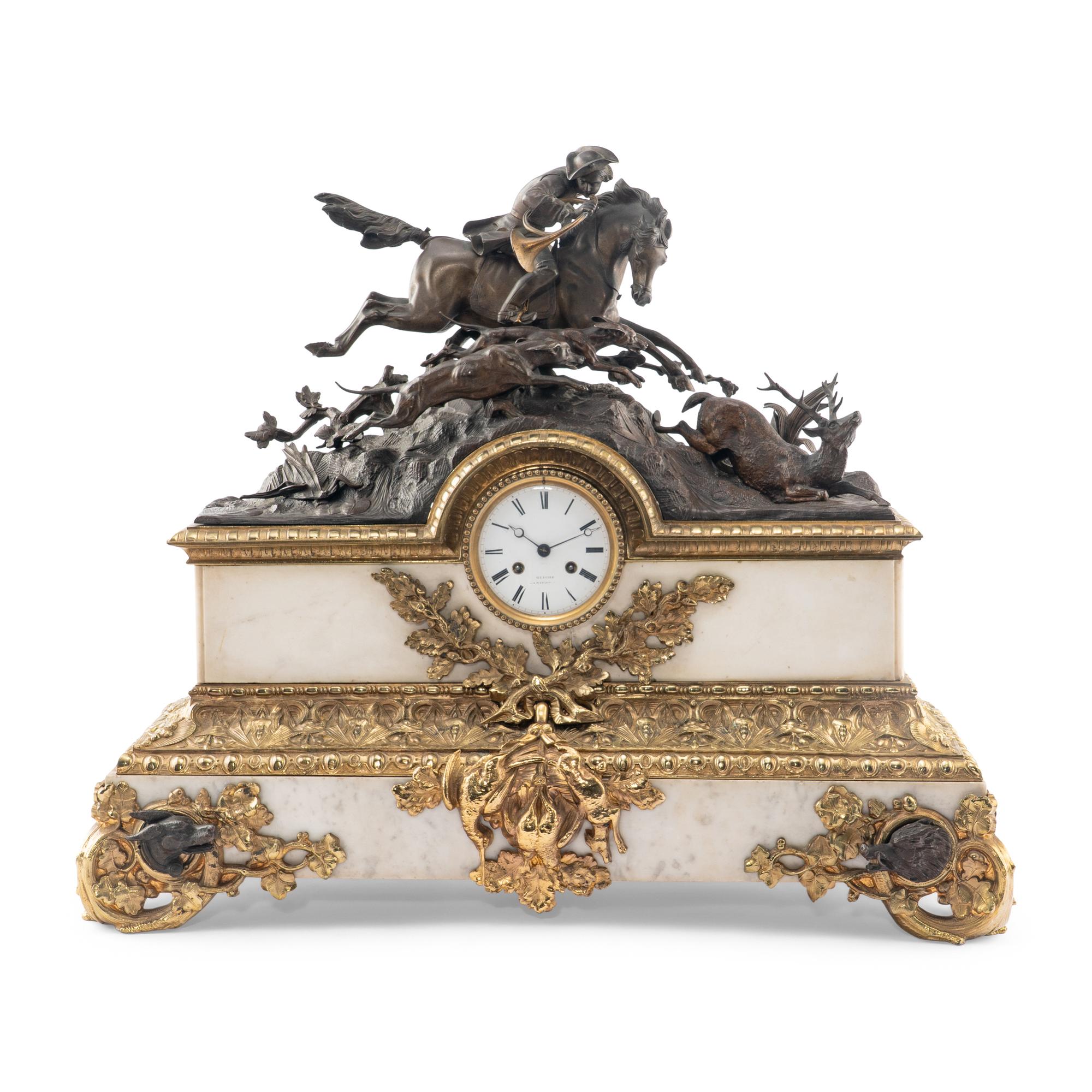 A French Parcel-Gilt Bronze Mounted Marble Mantel Clock