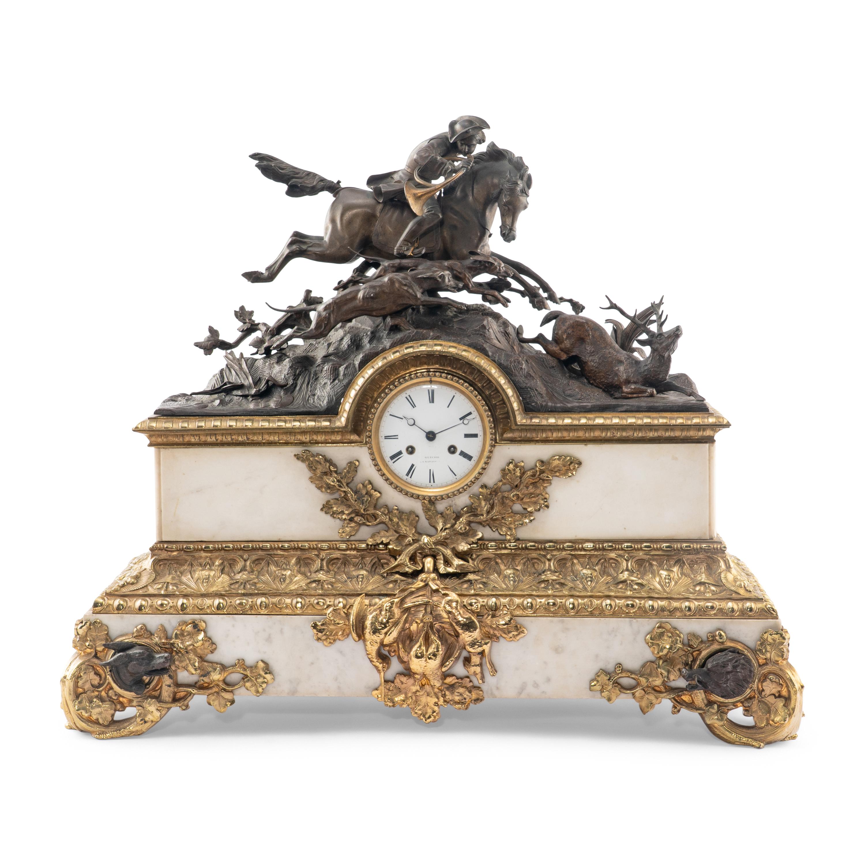 A French Parcel-Gilt Bronze Mounted Marble Mantel Clock