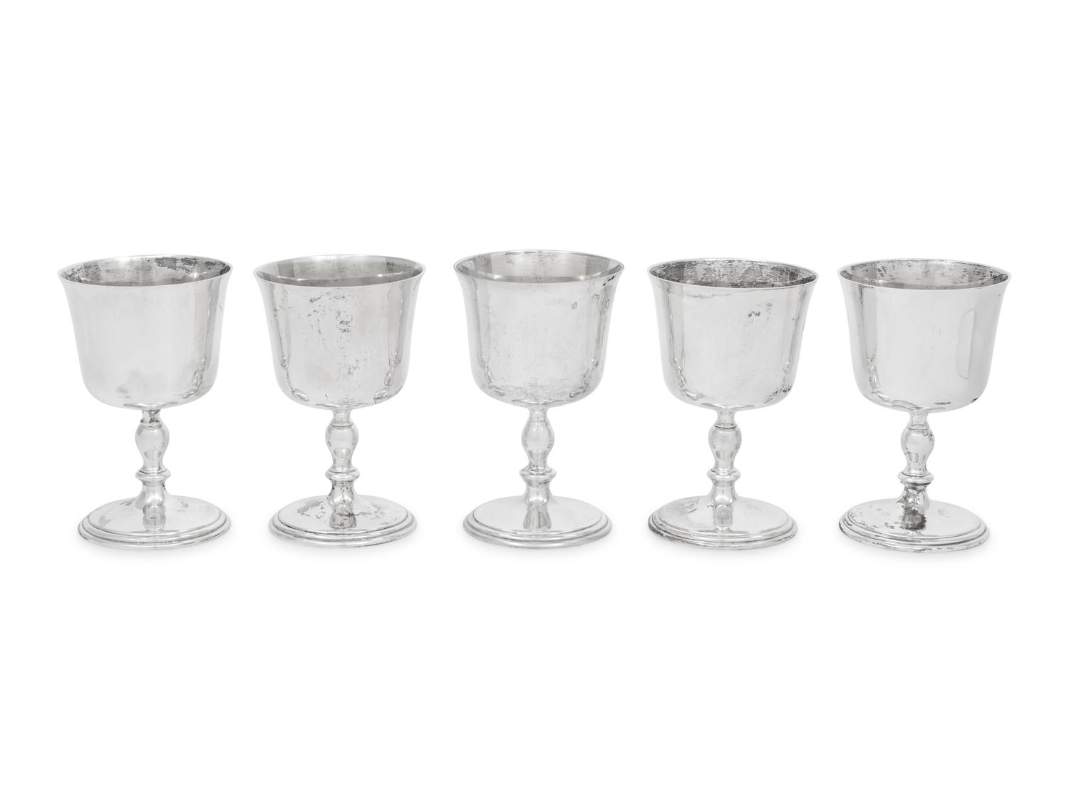 A Set of Five English Silver Goblets