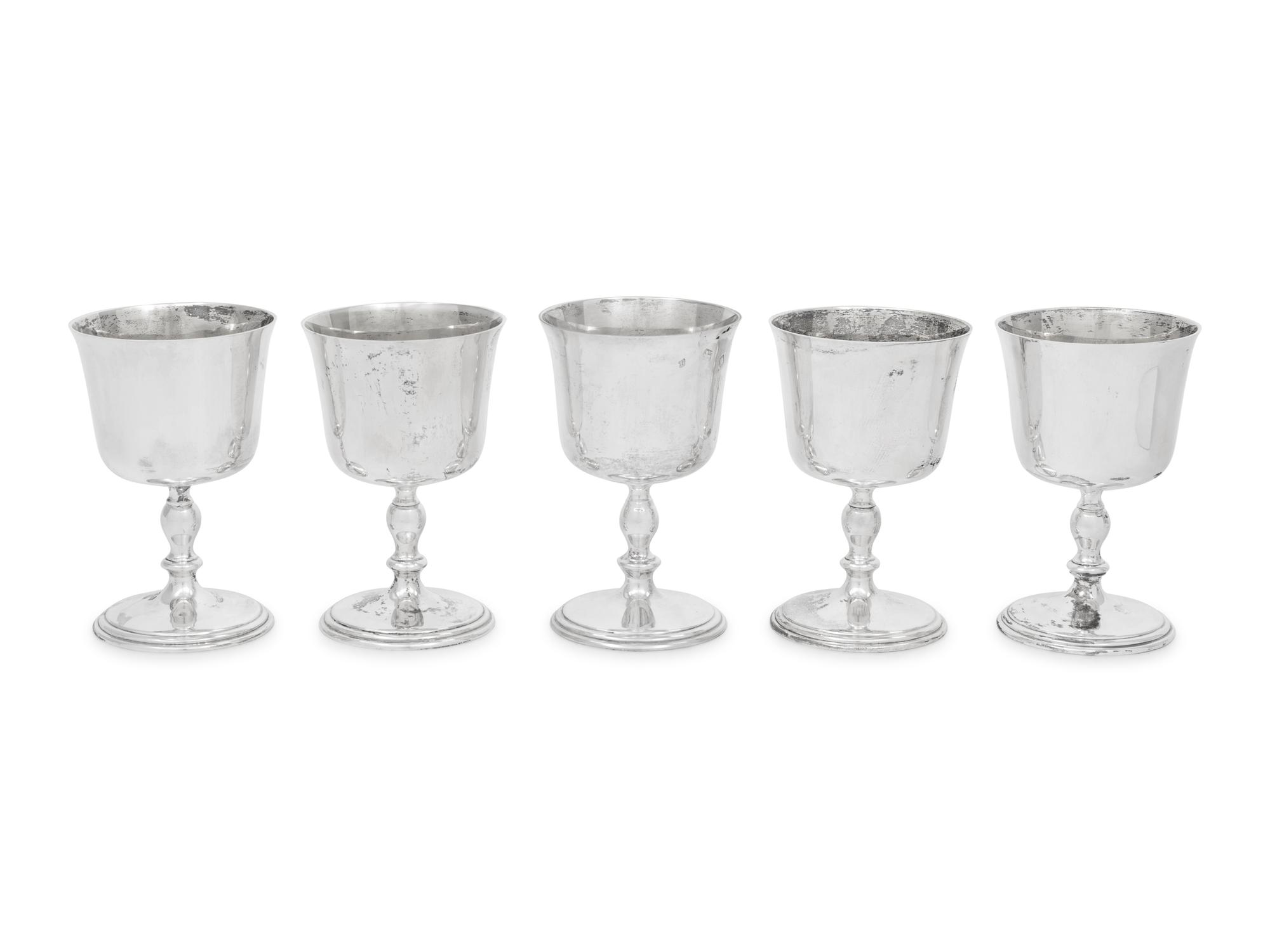 A Set of Five English Silver Goblets